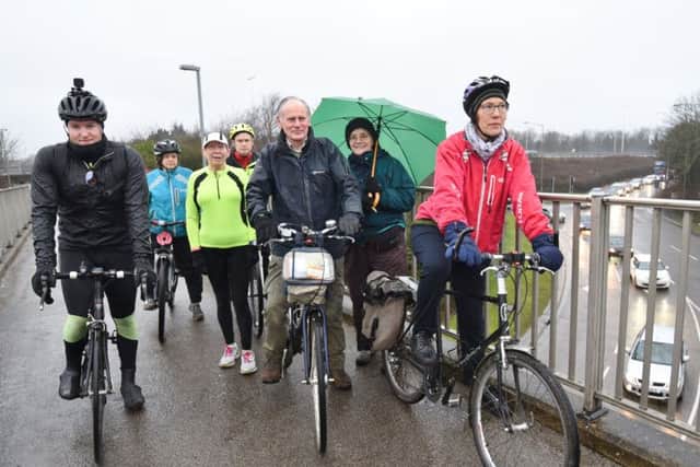 Sustrans cyclists protesting against the  proposed removal of Rhubarb Bridge, Lincoln Road EMN-170702-090952009