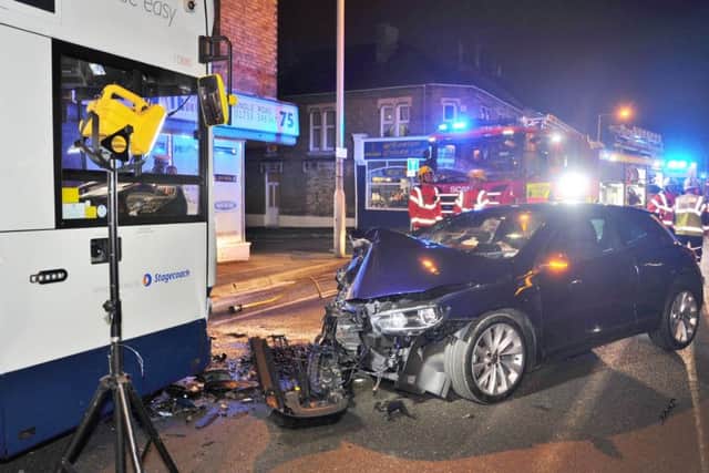Car and bus collide on Oundle Road, Woodston EMN-171221-191550009