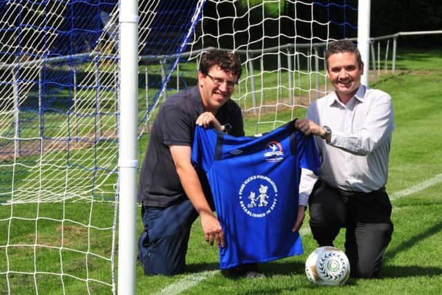 Steve Thorpe of Free Kicks Foundation (left).
