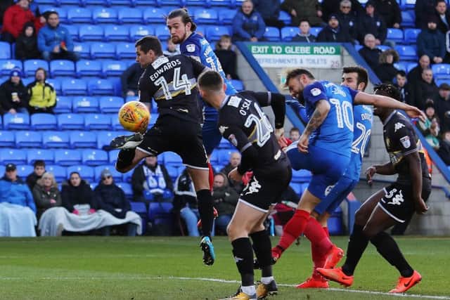 Danny Lloyd (10) heads home the opening goal of the game for Posh against Bury. Photo: Joe Dent/theposh.com.