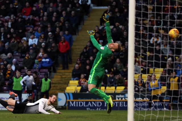 Jack Marriott scores the second Posh goal at Bradford City. Photo: Joe Dent/theposh.com.