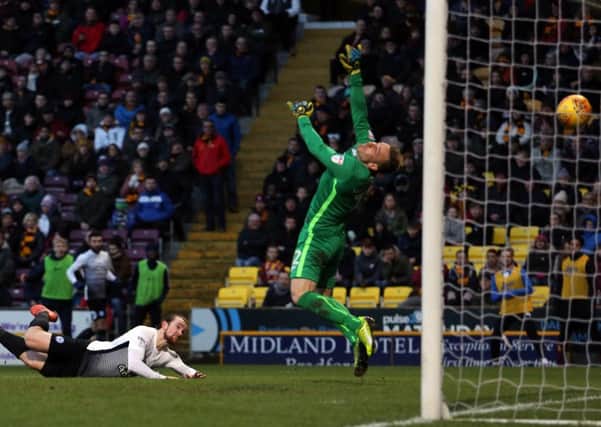 Jack Marriott scores the second Posh goal at Bradford City. Photo: Joe Dent/theposh.com.