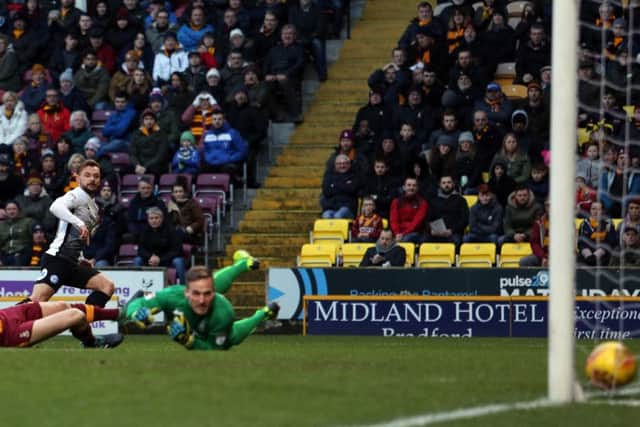 Danny Lloyd's perfecr finish puts Posh ahead at Bradford City. Photo: Joe Dent/theposh.com.