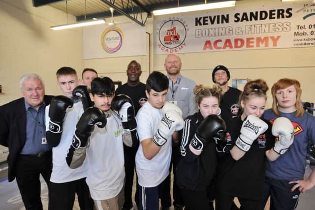 Councillor John Okonkowski (left) with coaches and boxers at the Kevin Sanders  Boxing Academy. Photo: David Lowndes.