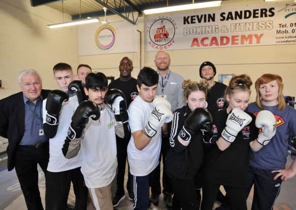 Councillor John Okonkowski (left) with coaches and boxers at the Kevin Sanders  Boxing Academy. Photo: David Lowndes.