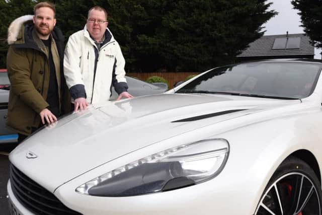 Gavin with Ashley and the Aston Martin