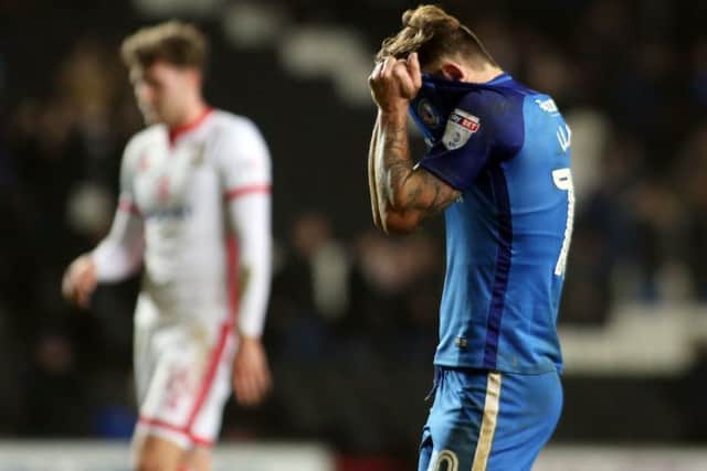 Posh man Danny Lloyd hides his embarrassment at the final whistle. Photo: Joe Dent/theposh.com.