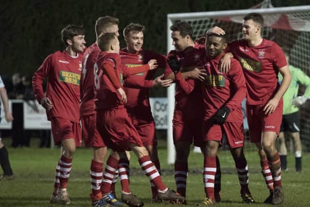 Christian Gordon (second right) is mobbed by teammates after scoring for Peterborough Northern Star at ON Chenecks. Photo: Chantelle McDonald. @cmcdphotos.