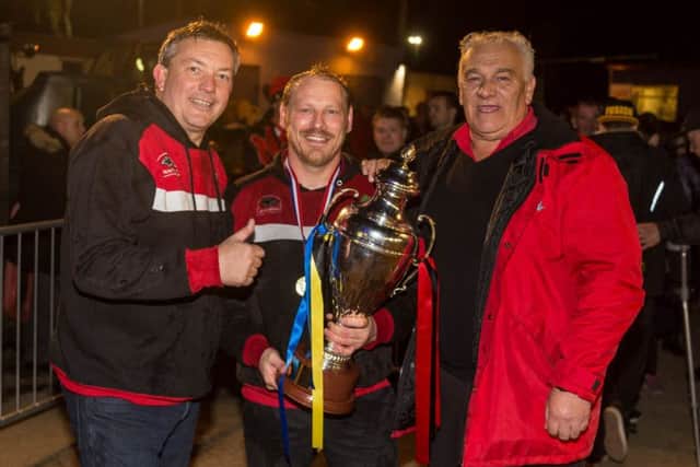Panthers team boss Carl Johnson, pictured here holding the SGB Championship KO Cup, is getting plenty of votes in Personality of the Year.