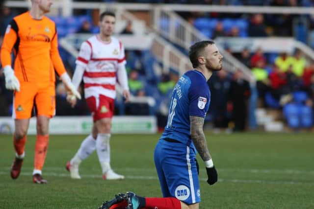 Posh star Marcus Maddison can't believe he hasn't been awarded a penalty against Doncaster. Photo: Joe Dent/theposh.com.