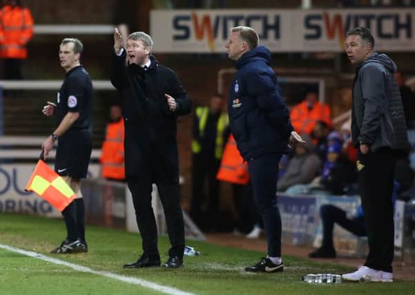 Posh manager Grant McCann issues instructions during the Doncaster game. Rovers boss Darren Ferguson is on the right. Photo: Joe Dent/theposh.com.