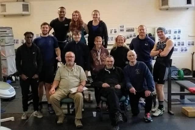 Former GB bobsleigh team member Ashley Watson (back left) was a comfortable winner of Nene Valley Harriers Olympic Christmas/New Year weightlifting competition held at the Peterborough Weight Training Club. He had the best snatch lift of 100kg and the best clean and jerk of 140kg for a winning 240kg total. The Peterborough Weight Training Club is the strength conditioning and strength training base for Harriers. Results (snatch, clean & jerk, total): Chloe Bates (guest) 26+35=61kg; Lydia Church 37.5+52.5=90kg; Devon Spencer  37.5+45=82.5kg; Georgie Ivens 45+55=100kg; Sean   Reidy 50+70=120kg; Simon Turnock 62.5+85=147.5kg; Abraham Jones 60+70=130kg; Ashley Watson 100+140=240kg.