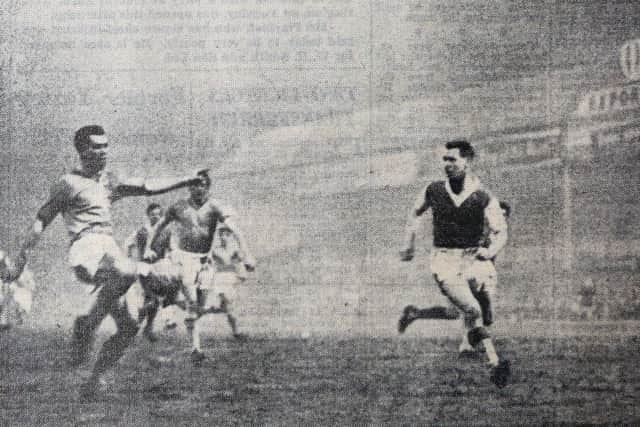 Peter McParland scores the winning goal for Aston Villa against Posh in a fourth round FA Cup tie.