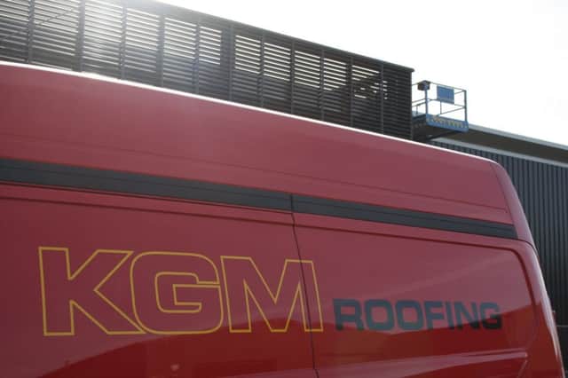 KGM Roofing.