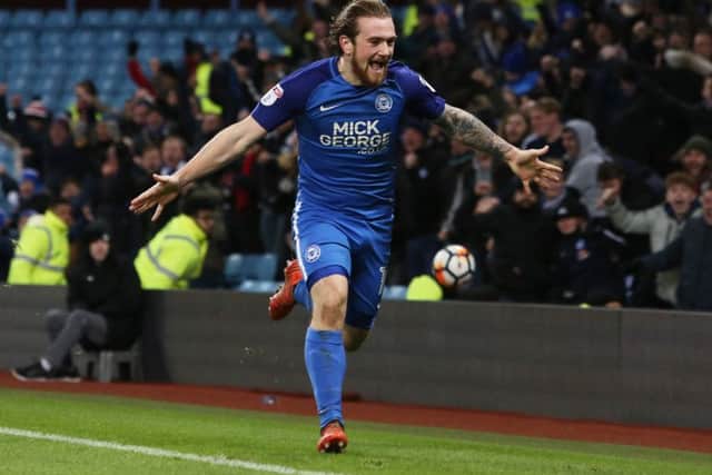Jack Marriott celebrates the Posh equaliser at Villa. Photo: Joe Dent/theposh.com.