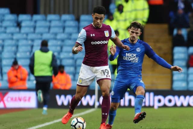 Posh right-back Liam Shephard closes down Villa's Andre Green. Photo: Joe Dent/theposh.com.