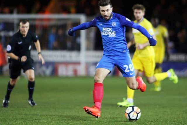 Midfielder Michael Doughty could be back in the Posh team at Luton.
