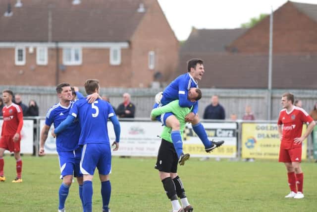 Yaxley celebrate their United Counties League Cup success last season.