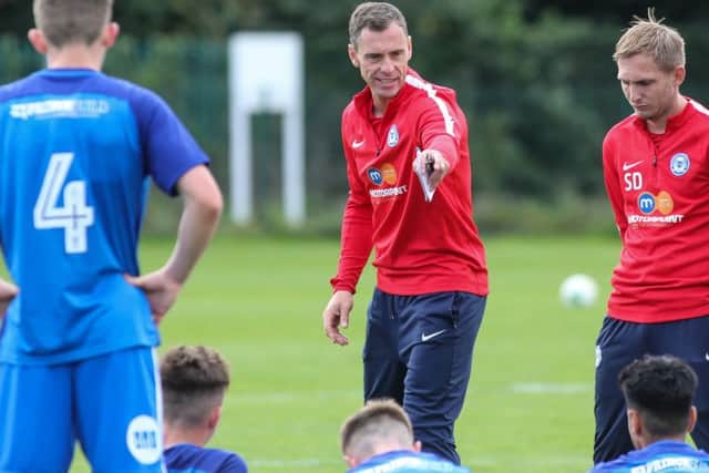David Farrell issues instructions to the Posh under 18 side.
