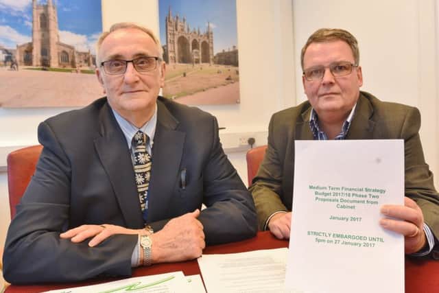 Councillors John Holdich and David Seaton with budget proposals. EMN-170127-165644009