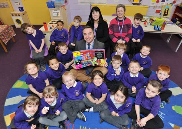 New Road Primary School Whittlesey -  reception class and staff with Executive Headteacher Rob Litten following their latest Ofsted report EMN-180901-215324009