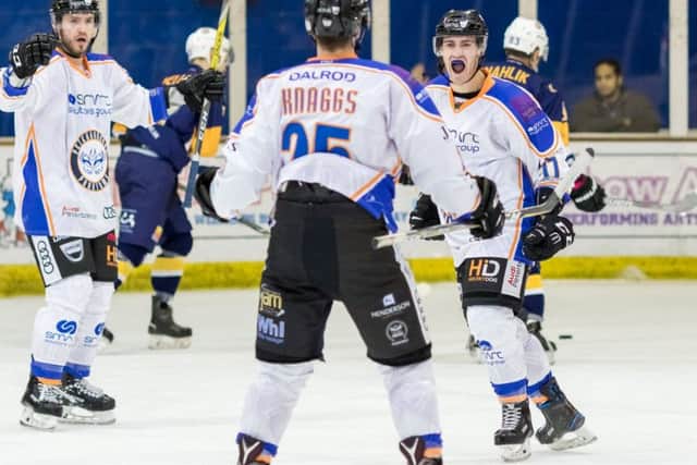 Owen Griffiths (right) celebrates scoring against London Raiders.