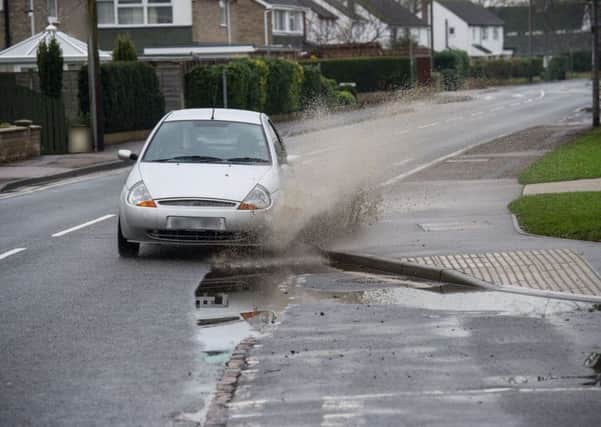 Photo of the puddle from SWNS (not the motorist in question)