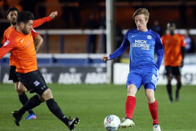 Posh midfielder Chris Forrester (right) should be back in action at Wigan.