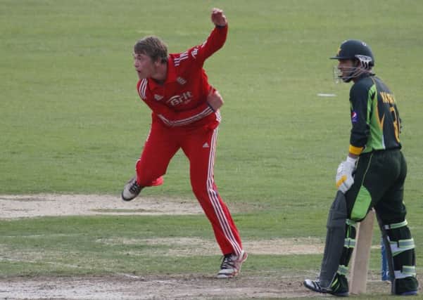 Rob Sayer bowling for England Under 19s.