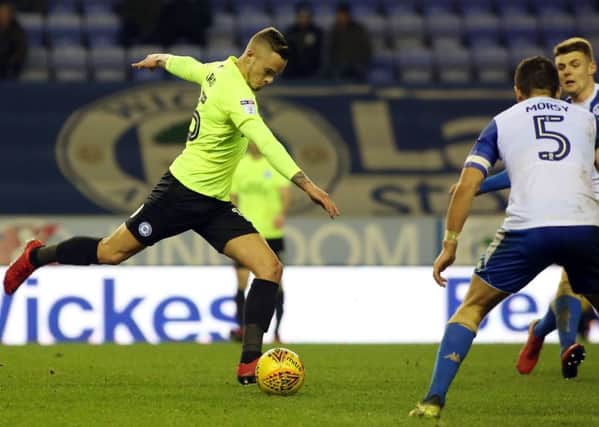 Posh debutant Joe Ward shoots at the Wigan goal in the final minute, an incident that led to a Jack Marriott 'goal' being disallowed for offside/Photo: Joe Dent/theposh.com