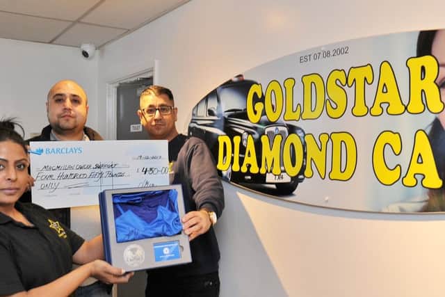 Amina Khan with Nasir Jan, Imhaz Azam and Faz Ali at Goldstar Diamond Cars, Fengate  cheque pres to Macmillan Cancer support. Cash was raised following the auction of a signed Posh football shirt EMN-171219-162049009