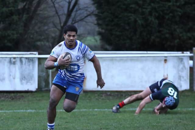 Sitanislei Semisi Tei leaves a Lichfield defender in his wake as he crosses for one of two tries for the Lions. Picture: Mick Sutterby