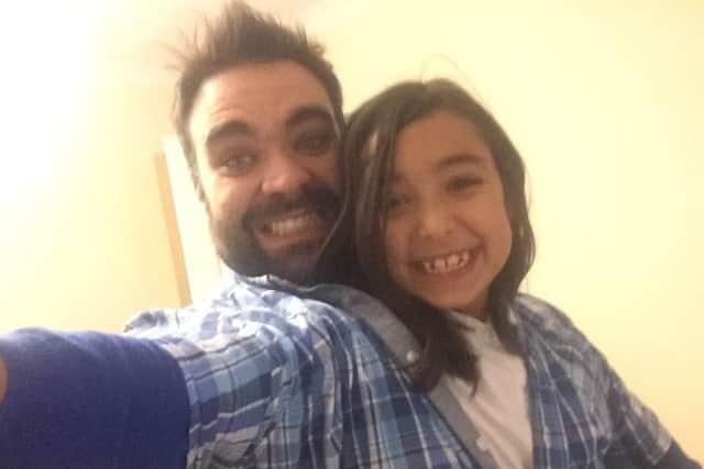 Chris Brudenell and daughter Sophie in one of his old shirts