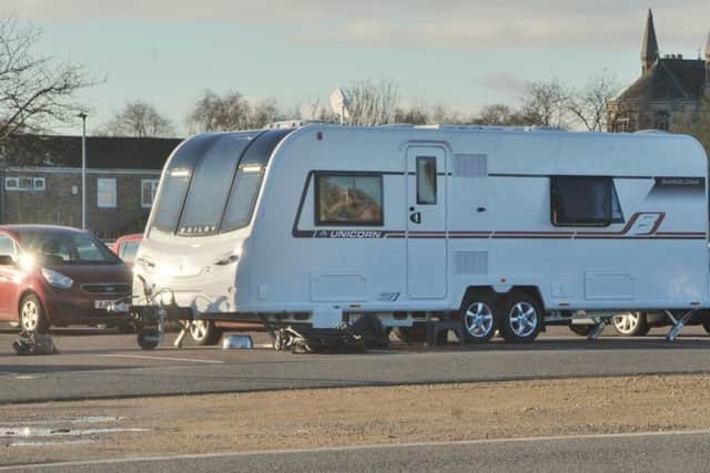 Travellers at Wellington Street Car Park EMN-180118-113921009