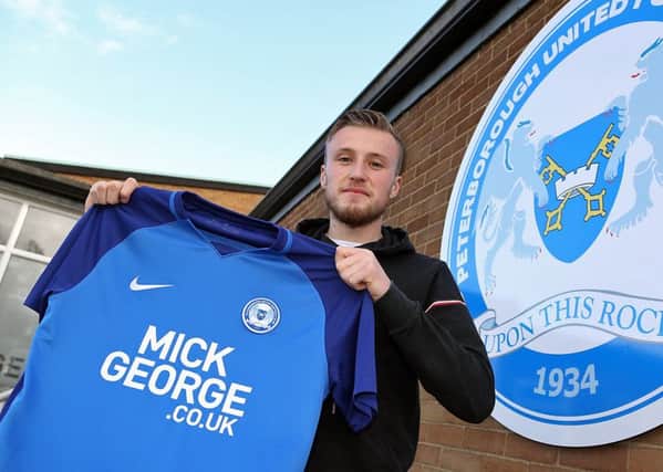 George Cooper pictured after signing for Posh. Picture: Joe Dent