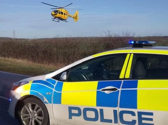 The East of England Air Ambulance at the scene of one of this morning's crashes