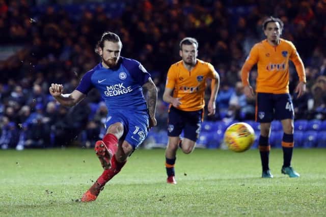 Jack Marriott makes it 3-0 for Posh against Oldham from the penalty sport. Photo: JoeDent/theposh.com.