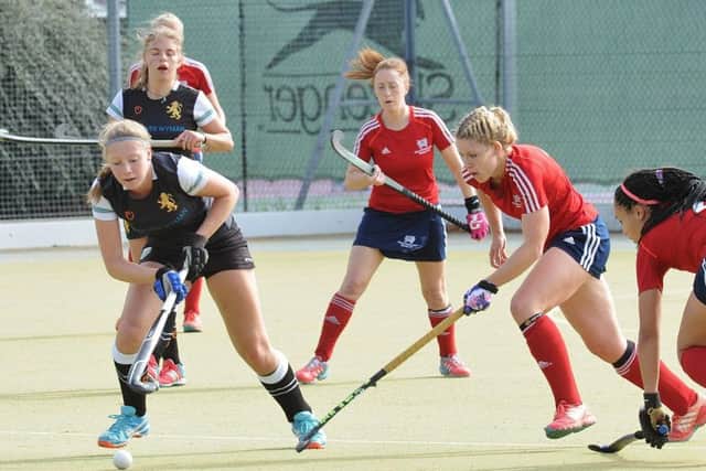 Anna Faux (red) scored for City of Peterborough Ladies against Maidstone.