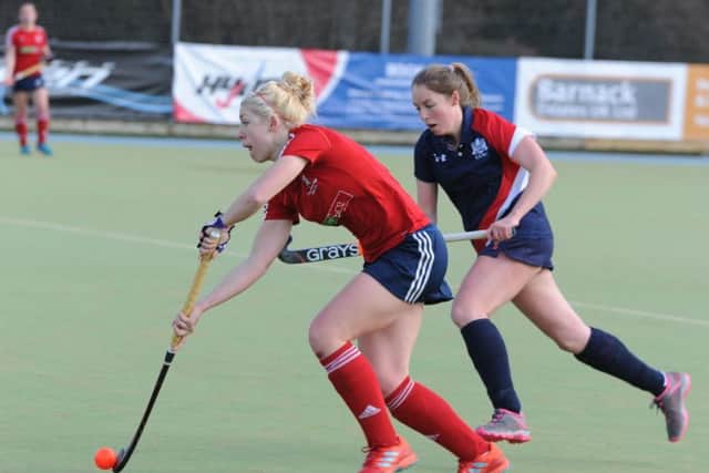 Anna Faux (red) will be a key player for City of Peterborough Ladies this weekend.