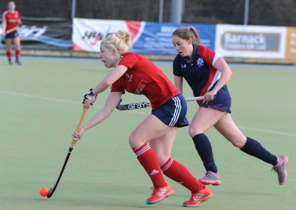 Anna Faux (red) will be a key player for City of Peterborough Ladies this weekend.
