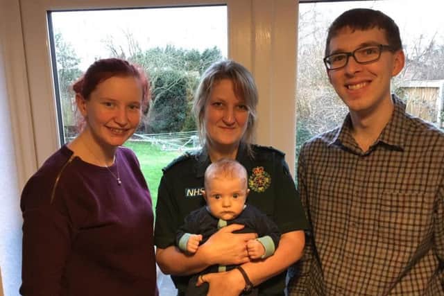 Beccy, Mark and Timothy White with call handler Sue Lamonte