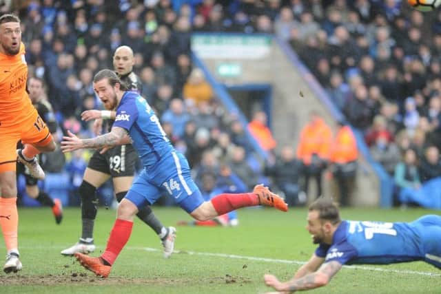 Posh forward Danny Lloyd couldn't quite convert this diving header against Leicester. Photo: David Lowndes.