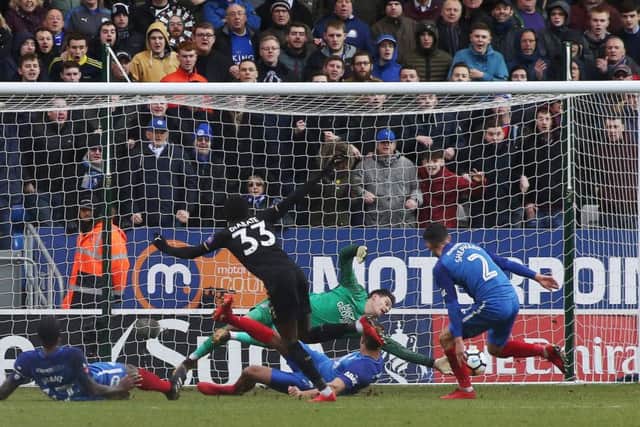 Jonathan Bond makes a fine save to thwart Leicester's Fousseni Diabate. Photo: Joe Dent/theposh.com.