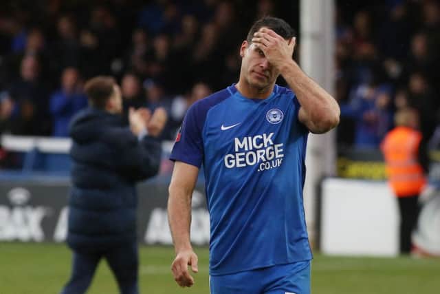 Posh defender Steven Taylor can't hide his disappointment after the 5-1 defeat by Leicester. Photo: Joe Dent/theposh.com.