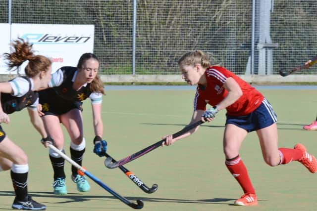 Robyn Gribble (red) scored for City of Peterborough Ladies against Ipswich.