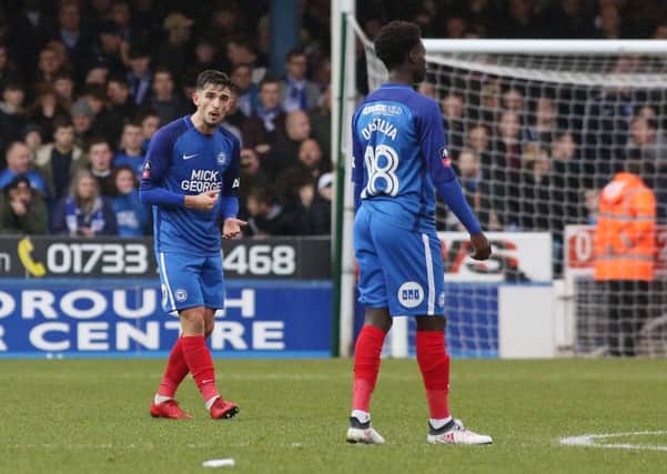 Liam Shephard (left) tries to encourage Leo Da Silva Lopes during the heavy FA Cup defeat at home to Leicester. Photo: Joe Dent/theposh.com.