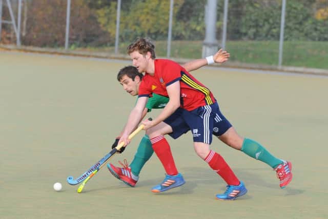 Danny Sisson (red) scored a cracking goal at Spalding.
