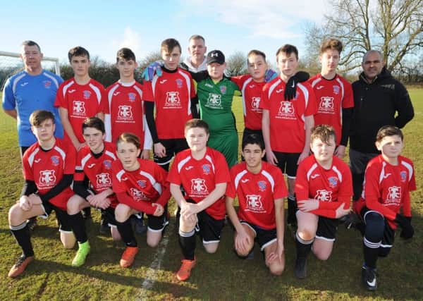 Pictured is the Whittlesey Reds Under 14 team that beat Wisbech St Mary 5-3 in the Hereward Cup. They are from the left, back, Michael King, Max Burton, Leon Clow, Tyler Hichin, Harry Lewis, Brett White, Harry Smith, Bradley Stock, Lewis King, Rich Bougaardt, front, Joe Sheridan, Josh Dolby, Jack Wallace, Nathan King, Luke Bougaardt-Palmer, Kyle Taylor and Max Cambridge.