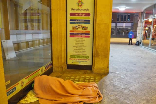A rough sleeper in St Peter's Arcade