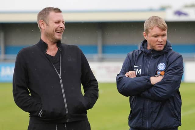 Posh manager Grant McCann (right) with club chairman Darragh MacAnthony.